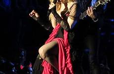 madonna bare exposes pulls exposing unimpressed performance brisbane shocks shocked thousands defends crowds sultry decidedly stunned say