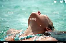 bikini teenage girl sunbathing water teen relaxing stock alamy sea