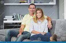 attractive couch sitting couple young their camera preview