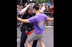 gif pride cop parade gay bust marcher officer move someone nypd play caught him got dances