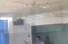 classroom sex having caught camera college girl china desk broad daylight tutor video window footage chinese filmed