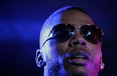 nelly rapper assault accused rape accusation auburn wtvg lawsuit settles usatoday testify sbs globalnews