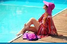sunbathing bikini lying woman sun pool tropical resort beautiful lounger near young travel sunny hot stock