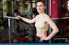 coach gym fitness posing female woman