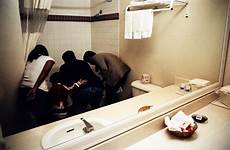 hotel strange refugee strangers land time refugees officer iom karen bathtub examine family