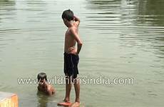 boys indian bath take pond bihar