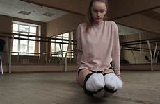flexible legs stretching dancer slow motion studio woman young
