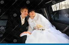 inside groom bride limousine sitting preview