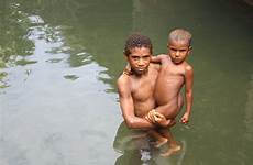 boys river papua water bad guinea bathing children outside public drinking worse cholera going quality health madang two