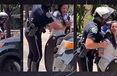 police officer groping woman breasts her arrest he during distressed searches filmed grope gropes july posted