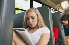 bus girl school student studying stocksy