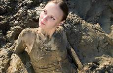 mud woman lying