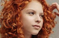 curly red hair girl freckles shaped heart portrait