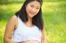 pregnant asian woman beautiful relaxing premium freeimages stock istock getty