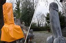 penis statue giant condom covered world bright controversial express yellow holy solved problem uncovered