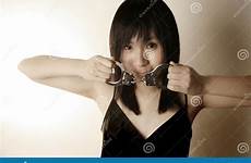 handcuffs girl asian holding stock royalty happy