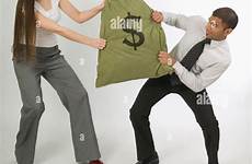 fighting over money couple bag alamy