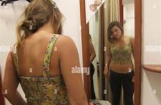 changing room clothes girl trying teenage alamy