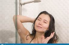 chinese asian taking shower woman bathroom happy her enjoying hygiene washing morning hair young beautiful beauty domestic cute