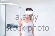 undressing bathroom woman young alamy stock