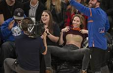 crowd flashes game jumbotron whitney cummings sweater knicks getting she pulls cam funny nike boot sneaker dunk show