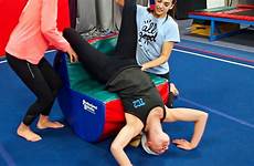 gymnastics sister teaching