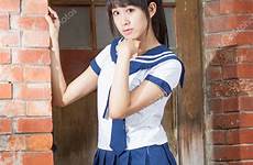 asian schoolgirl uniform school outside depositphotos stock