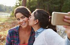 lesbian kiss couple selfie countryside take stock dissolve