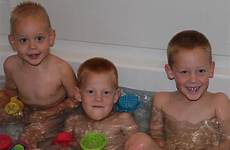 boys bathtub tub together recently outside water