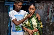 mother prostitute teen his indian sex kolkata rajib train he india boy women man slum slumdog family brother school her