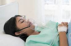 patient asian young woman hospital bed oxygen receiving stock mask lying depositphotos