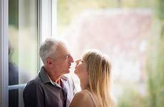man woman old young dating hugging senior stock couple royalty blond attractive handsome him looking
