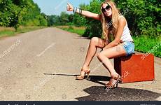 hitchhiking woman along pretty road young shutterstock stock search
