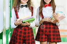 schoolgirls school uniforms funny two books standing dreamstime hallway preview