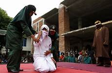 public woman sex caned having punishment outside indonesian young muslim marriage whipped whipping aceh stage man her she forced men
