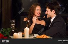 couple romantic having dinner restaurant stock feeding