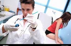 gynecologist pap smear test cervical performing teenage alamy