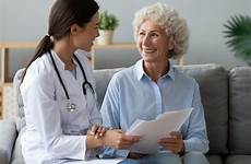 doctor patient woman old happy young papers patients