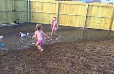 mud playing girls
