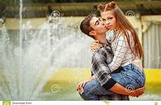 kiss enamoured teenagers hugged strongly holding girl big boy stock boyfriend girlfriend hug arms