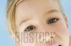 tongue girl sticking young her stock depositphotos monkeybusiness twitter photography lightbox create royalty preview