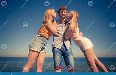 boy girls two kissing stock fun having friends women outdoor man group