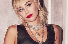 miley cyrus strips racy coffin celebrity