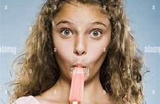 popsicle girl eating alamy