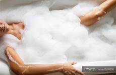 bath bathtub woman taking foam stock hygiene