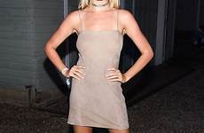hailey clauson legs illustrated long girl sports her dress artists off piercing model shows cover benefit tiny strappy choker beige