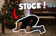 stuck sis step under tree gets christmas