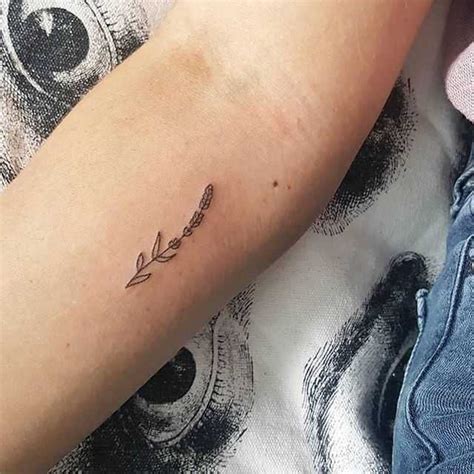 Calmness is easily attributed to lavender, especially when you consider its properties when consumed by humans. Tiny lavender tattoo by Pokyo Pokyo - Tattoogrid.net