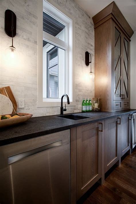 Keeping things light above the countertop allow the room to feel crisp and bright. What is the best color combination for kitchen cabinets with black countertop? - Quora