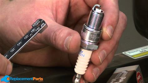 Warm oil drains quickly and completely. How to Replace the Spark Plug on a Honda HRX217 Lawn Mower ...